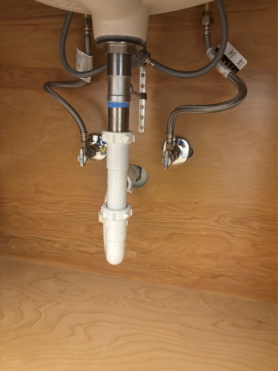 Drain assembly under sink